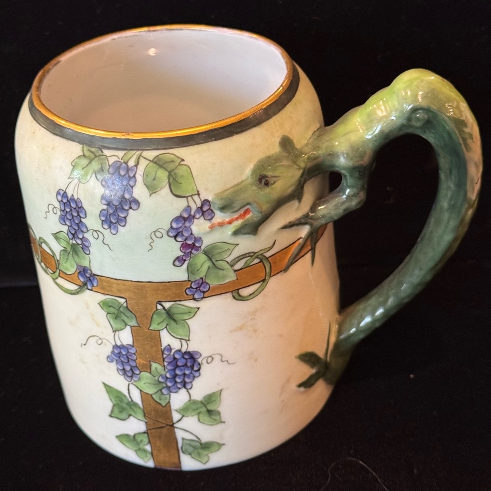 Antique Dragon Handled Porcelain Tankard with Hand-Painted Grapevine Designs